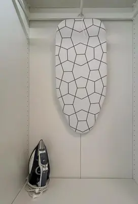 a mirror is hanging on a wall next to a car at Barcelona Touch Apartments - Creu dels Molers in Barcelona