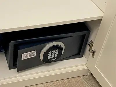 a microwave oven in a drawer in a cabinet at Barcelona Touch Apartments - Creu dels Molers in Barcelona