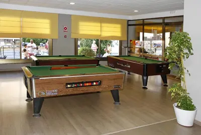 two billiard tables in a room with sidx sidx sidx at Hotel Bon Repos in Calella