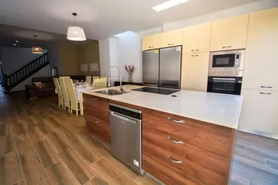 a kitchen with a sink and a counter top at Casa grande con piscina en el centro de Calella, Tramuntana in Calella