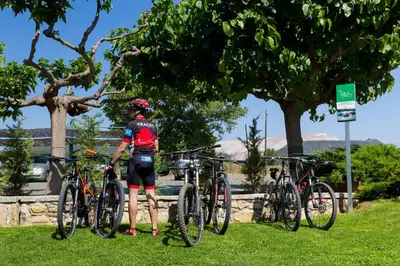 a man standing next to a group of bikes at Mas de la Sala in Sallent del Llobregat