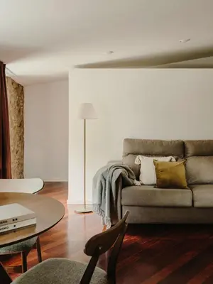 a living room with a couch and a table at Paratgea in Llinars del Vallès