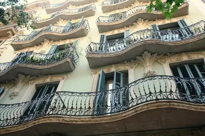 a building with balconies on the side of it at The Conica Deluxe Bed&Breakfast in Barcelona