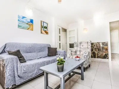 a living room with a couch and a table at Apartment Bahia by Interhome in Cunit