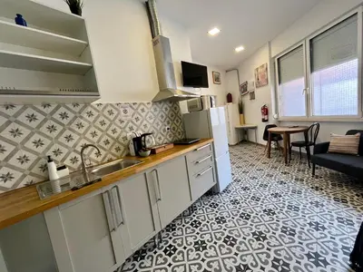 a kitchen with a sink and a counter top at INT Studio totalmente equipado, 15' de BCN centro 8' playa in Sant Adria de Besos