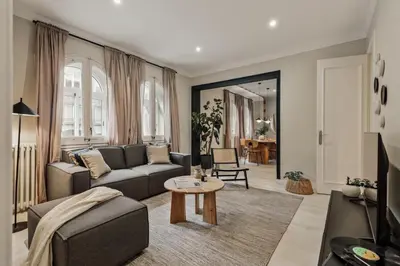 a laundry room with a washer and dryer at Cember - 3 bedrooms and patio in Sant Gervasi in Barcelona