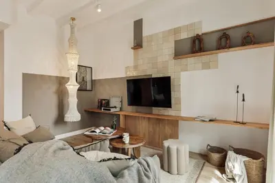 a living room with a couch and a table at Orosi - 2 bedrooms and balcony in Poble Sec in Barcelona