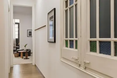 a living room with a couch and a table at Reis - 3 bedrooms and balcony in Vila de Gràcia in Barcelona