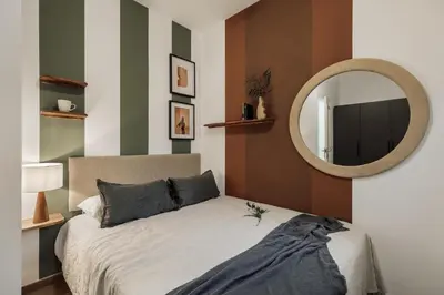 a room with a door and a hallway at Reis - 3 bedrooms and balcony in Vila de Gràcia in Barcelona