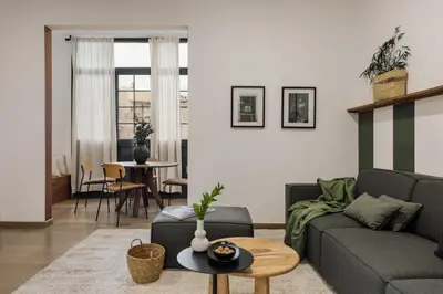 a bathroom with a toilet and a sink and a shower at Reis - 3 bedrooms and balcony in Vila de Gràcia in Barcelona