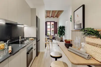 a bedroom with a large bed and a window at Estiu - 2 bedrooms and balcony in Sant Antoni in Barcelona