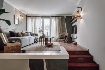 a bathroom with a sink and a bath tub at Holo - 2 bedrooms in Eixample Dreta in Barcelona