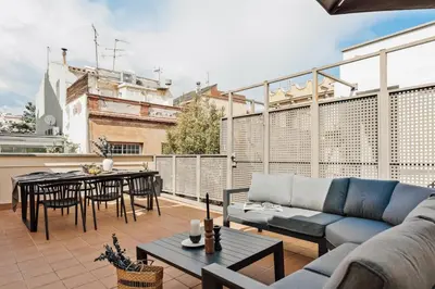 a bedroom with a bed with speakers on the wall at Arenal - 3 bedrooms and terrace in Sarrià in Barcelona