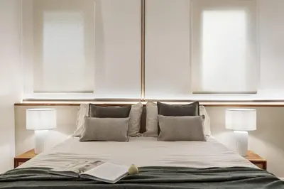 a living room with a couch and a table at Isola - 1 bedroom and terrace in Eixample Dreta in Barcelona
