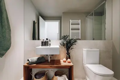 a bedroom with a bed with two mugs on it at Algar - 1 bedroom and balcony in Eixample Esquerra in Barcelona