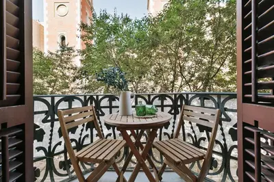 a bathroom with a sink and a shower and a toilet at Baia - Studio and balcony in Eixample Esquerra in Barcelona