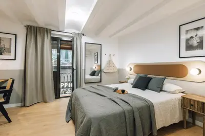 a bathroom with a shower and a toilet and a sink at Acatenango - 2 bedrooms in El Born in Barcelona