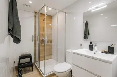 a bedroom with a desk and a bed at Acatenango - 2 bedrooms in El Born in Barcelona
