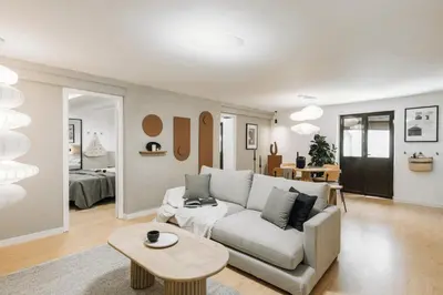 a bedroom with a large bed with a surfboard on it at Acatenango - 2 bedrooms in El Born in Barcelona