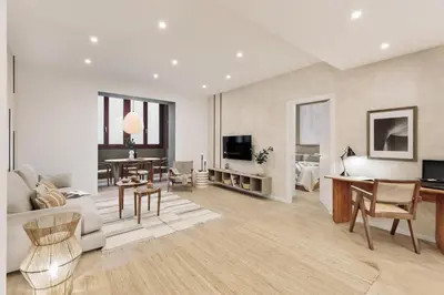 a bathroom with a toilet and a glass shower at Camerota - 2 bedrooms, terrace and balcony in Ciutat Vella in Barcelona