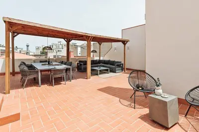 a white kitchen with a sink and a dishwasher at Camerota - 2 bedrooms, terrace and balcony in Ciutat Vella in Barcelona