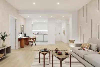 a living room with a couch and a table at Camerota - 2 bedrooms, terrace and balcony in Ciutat Vella in Barcelona