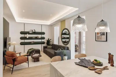 a living room with a couch and a table at Sishane - 3 bedrooms and terrace in Eixample Esquerra in Barcelona