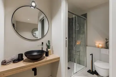 a bathroom with a shower and a toilet and a sink at Ipek - 2 bedrooms and balcony in Sant Pere in Barcelona