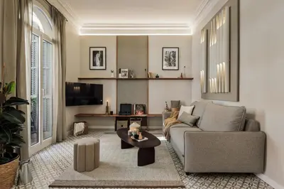 a bedroom with a bed with a teddy bear on it at Niria - 2 bedrooms and balcony in Eixample Esquerra in Barcelona