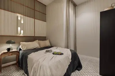 a living room with a couch and a table at Niria - 2 bedrooms and balcony in Eixample Esquerra in Barcelona