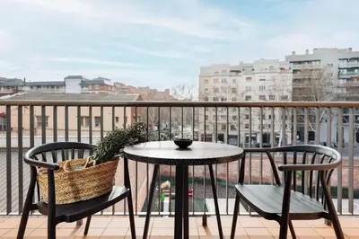 a bathroom with a sink and a tub and a mirror at Aliga - 3 bedroom and pool in Les Corts in Barcelona