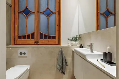 a bedroom with a bed and a glass shower at Claes - 2 bedrooms and balcony in Sant Gervasi - La Bonanova in Barcelona