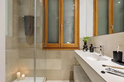a bathroom with a sink and a glass shower at Claes - 2 bedrooms and balcony in Sant Gervasi - La Bonanova in Barcelona