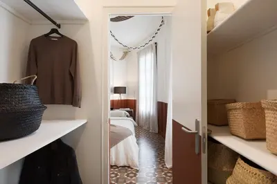 a bedroom with two beds in a room at Taoudeni - 3 bedrooms in Eixample Esquerra in Barcelona