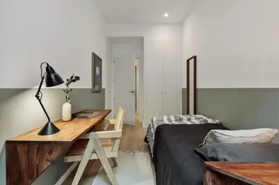 a kitchen and dining room with a table and chairs at Pogerola - 2 bedrooms, balcony and terrace in Ciutat Vella in Barcelona