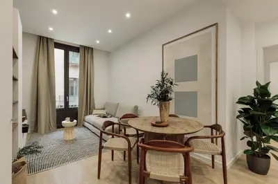 a bathroom with a shower and a toilet and a sink at Pogerola - 2 bedrooms, balcony and terrace in Ciutat Vella in Barcelona