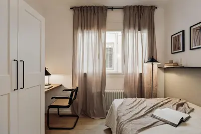 a living room with a couch and a table at Tamar - 2 bedrooms and terrace in Sant Gervasi in Barcelona