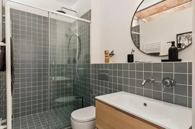 a room with white cabinets and a desk with a chair at Tamar - 2 bedrooms and terrace in Sant Gervasi in Barcelona