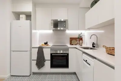 a living room with a couch and a table at Cantone - 2 bedrooms, balcony and terrace in Ciutat Vella in Barcelona
