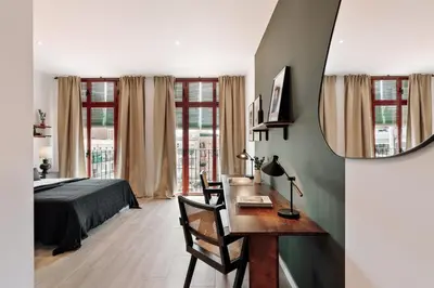a bathroom with a toilet and a sink and a shower at Kline - 2 bedrooms and terrace in Sant Antoni in Barcelona