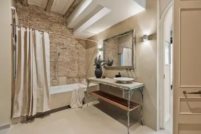 a bedroom with a large bed in a room at Galata - 3 bedrooms and terrace in Vila de Gràcia in Barcelona