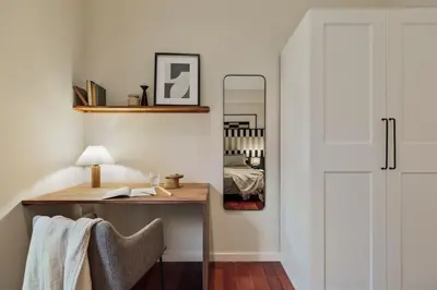 a living room with a couch and a table at Sark - 3 bedrooms and balcony in Sant Gervasi in Barcelona