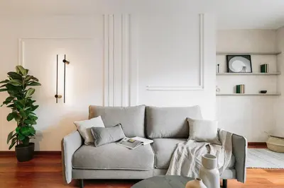 a bedroom with a bed with two lamps and two books at Tramonto - 3 bedrooms and balcony in Sant Antoni in Barcelona