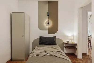 a living room with a couch and a table at Nicoya - 3 bedrooms and balcony in Eixample Dreta in Barcelona