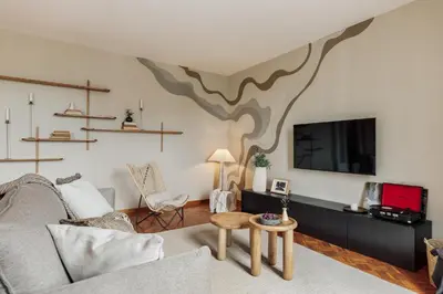 a white kitchen with white cabinets and a sink at Nicoya - 3 bedrooms and balcony in Eixample Dreta in Barcelona