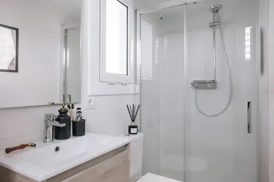 a bedroom with a bed with a basket of eggs on it at Nerja - 1 bedroom and terrace in Sant Gervasi in Barcelona
