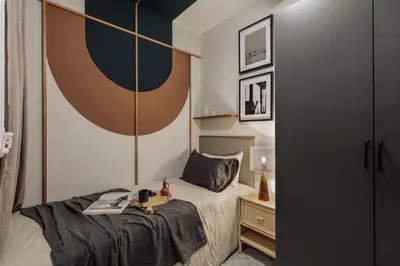 a dining room with a table and chairs at Yesil - 2 bedrooms and office in Sant Antoni in Barcelona