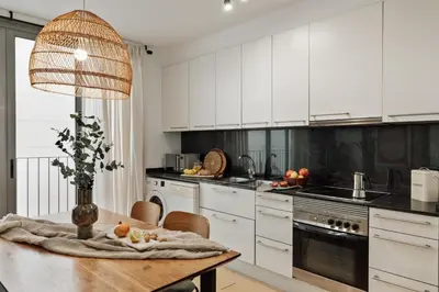 a living room with a desk and a television at Mercan - 2 bedrooms in Sant Pere in Barcelona