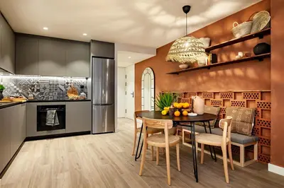a living room with a table and a couch at Kufra - 3 bedrooms in Eixample Esquerra in Barcelona