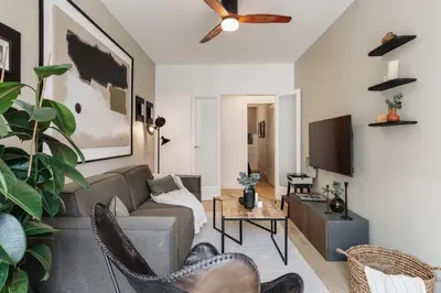a living room with a desk and a bedroom at Holzer - 2 bedrooms in Sant Antoni in Barcelona